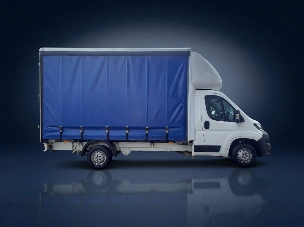 Curtainsider with a blue side curtain, side view