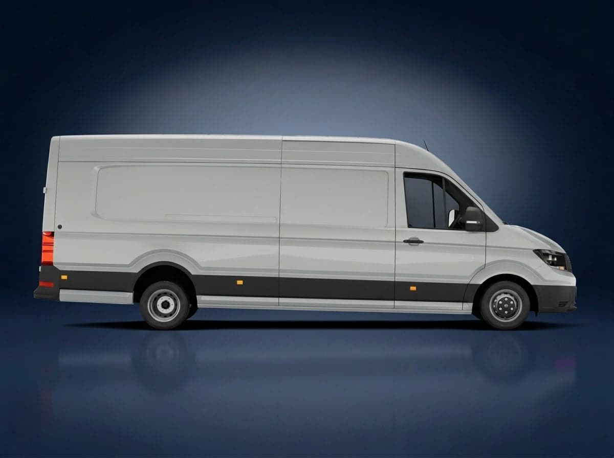 Silver long-wheelbase high-roof panel van, side view